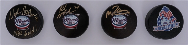 Lot of 4 Miracle on Ice Hockey Pucks w/ 3 Autographs