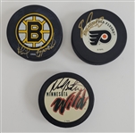 Lot of 3 Eric Lindros, Phil Esposito, & Neal Broten Autographed Hockey Pucks Beckett