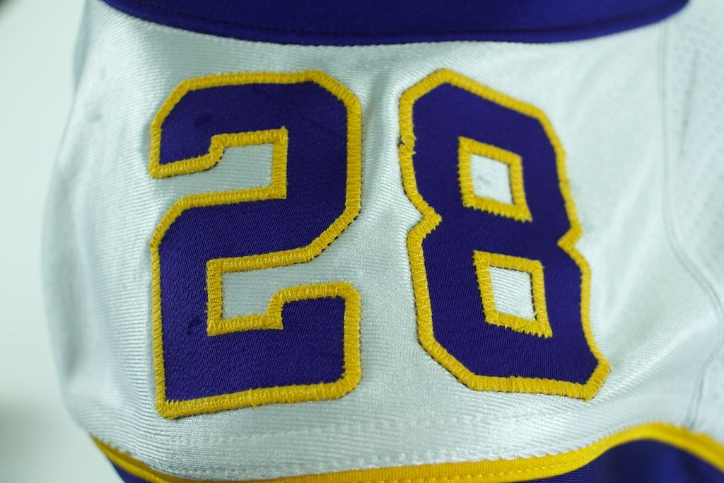 Lot Detail - 2009 Adrian Peterson Significant Game Worn Minnesota Vikings  Throwback Jersey (Team LOA)