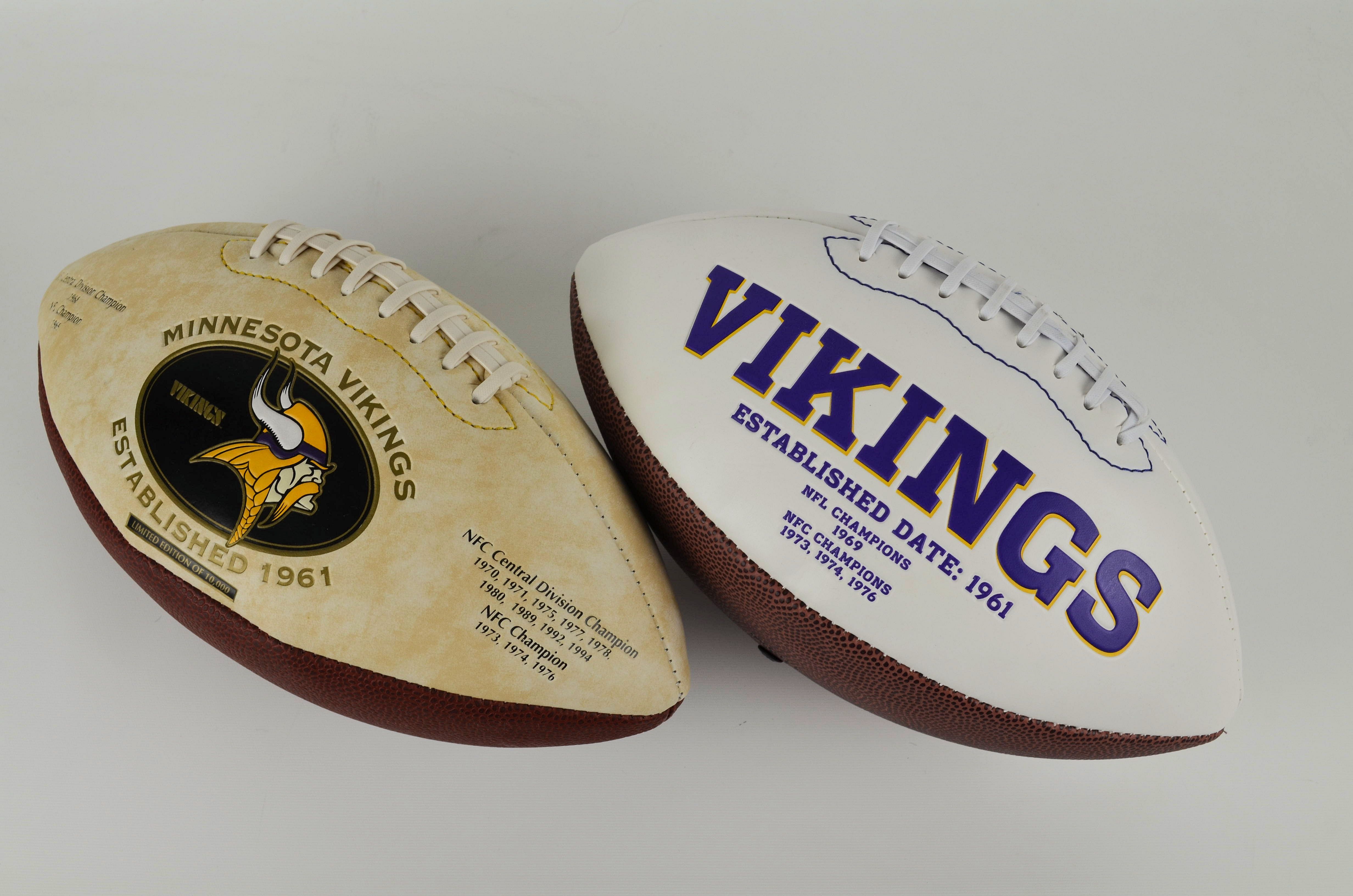 Lot Detail - Minnesota Vikings Lot Of 2 Commemorative Footballs