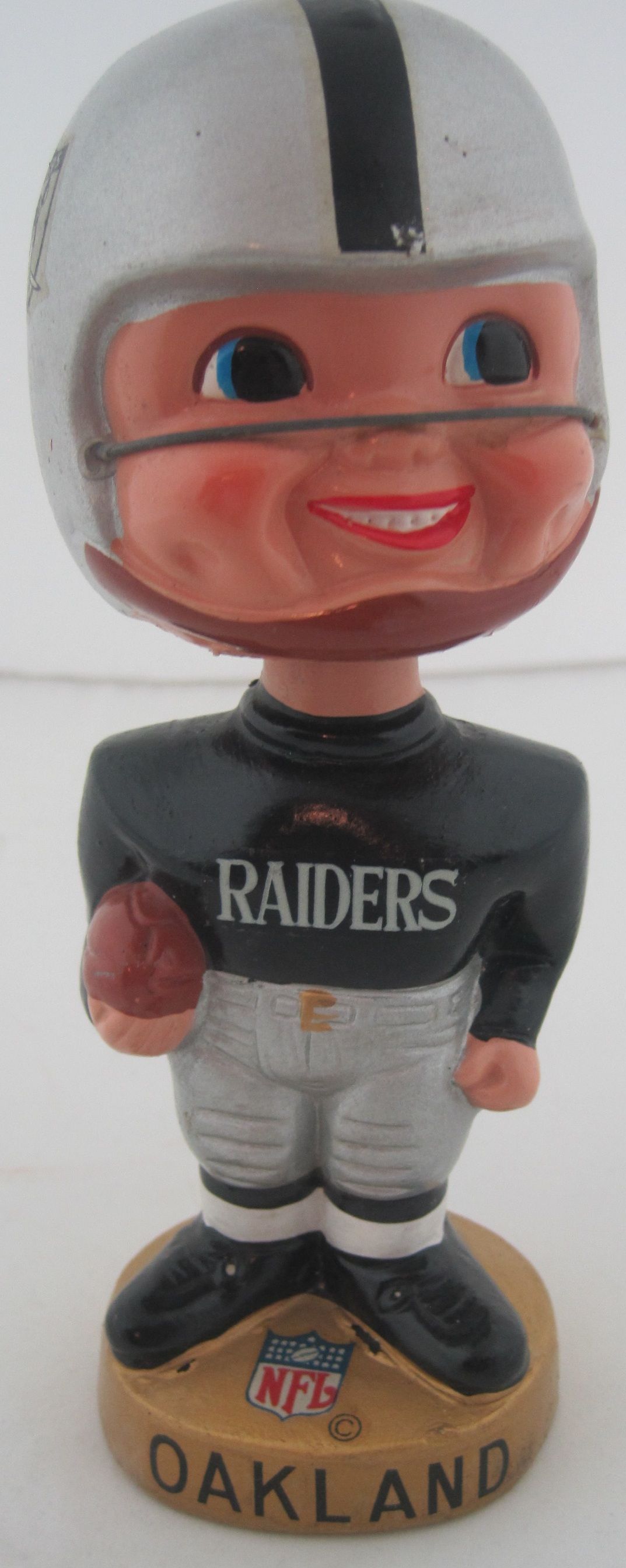 Sold at Auction: 1975 Oakland Raiders Bobblehead Nodder