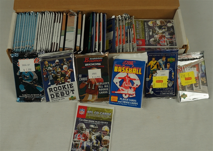 Collection of 63 Unopened Packs of Trading Cards