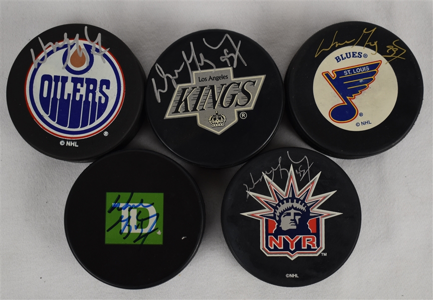 Wayne Gretzky Lot of 5 Autographed Hockey Pucks UDA
