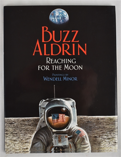 “Reaching for the Moon” hard cover book signed by Buzz Aldrin and artist Wendell Minor