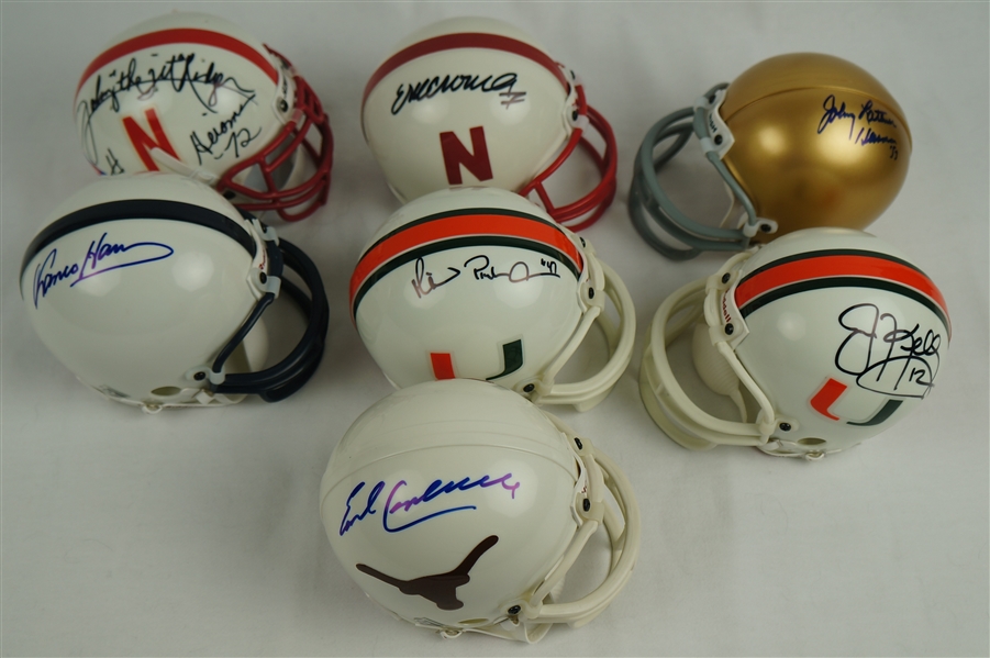 Collection of 7 Autographed NCAA Mini Football Helmets