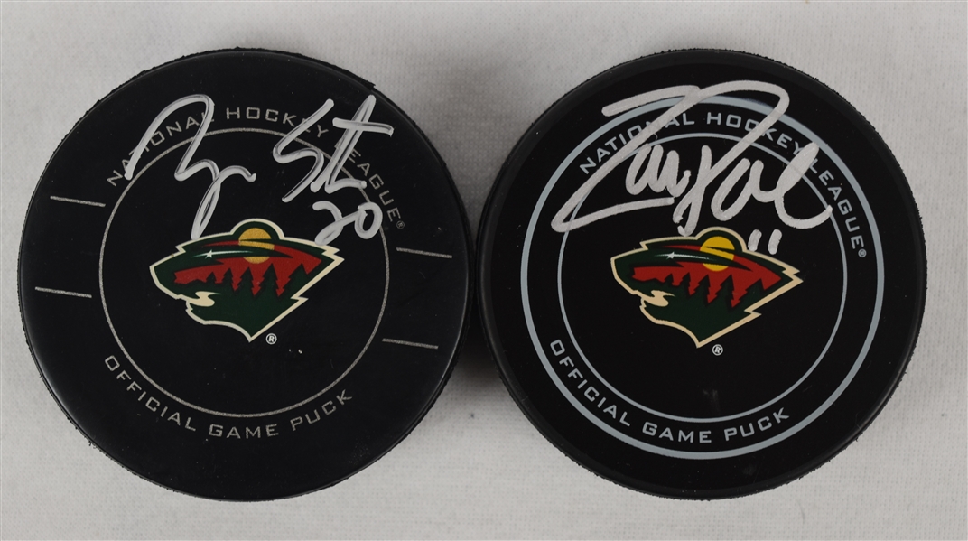 Zach Parise & Ryan Suter Autographed Minnesota Wild Hockey Pucks