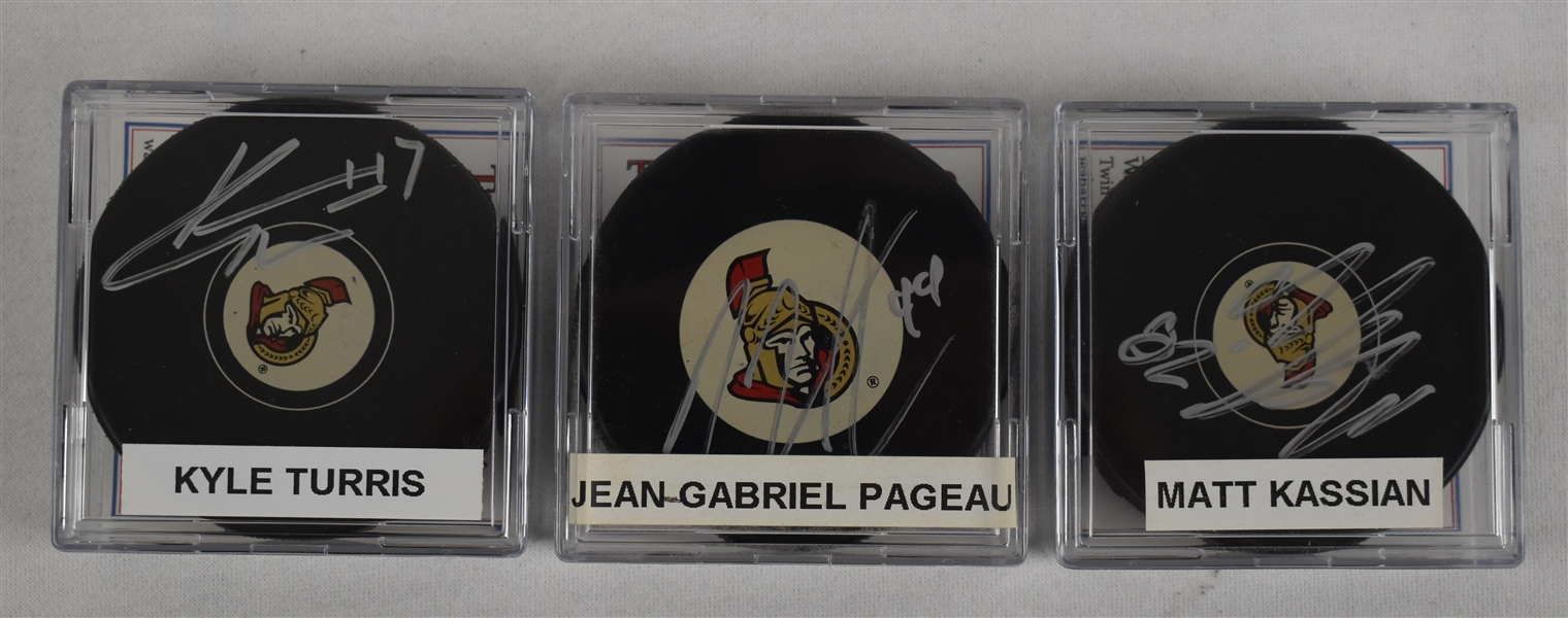 Turris Kassian & Pageau Lot of 3 Autographed Hockey Pucks w/Case
