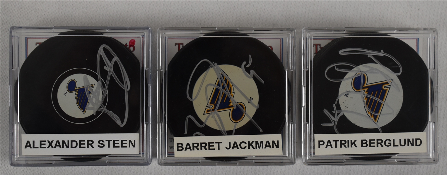 Steen Jackman & Berglund Lot of 3 Autographed Hockey Pucks w/Case