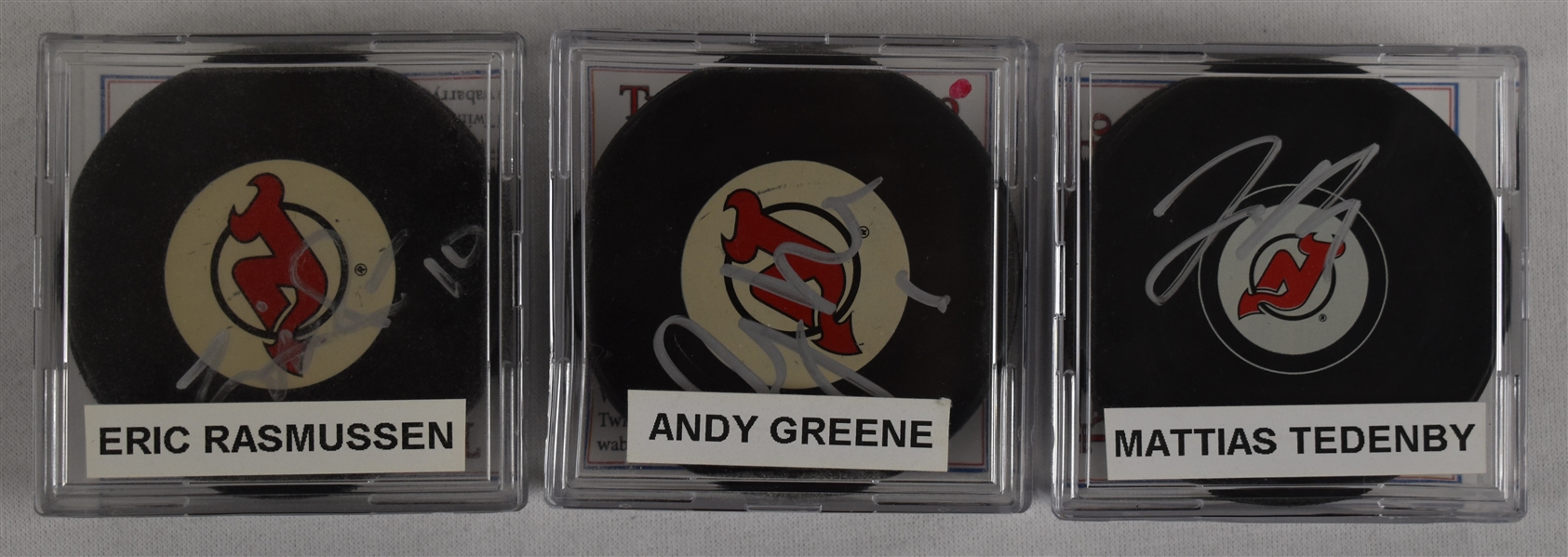 Tedenby Rasmussen & Greene Lot of 3 Autographed Hockey Pucks w/Case