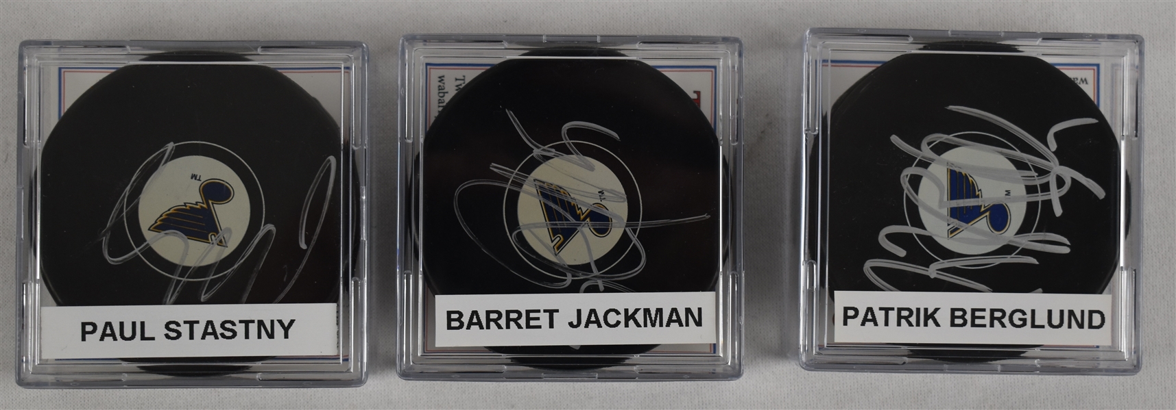 Stastny Jackman & Berglund Lot of 3 Autographed Hockey Pucks w/Case