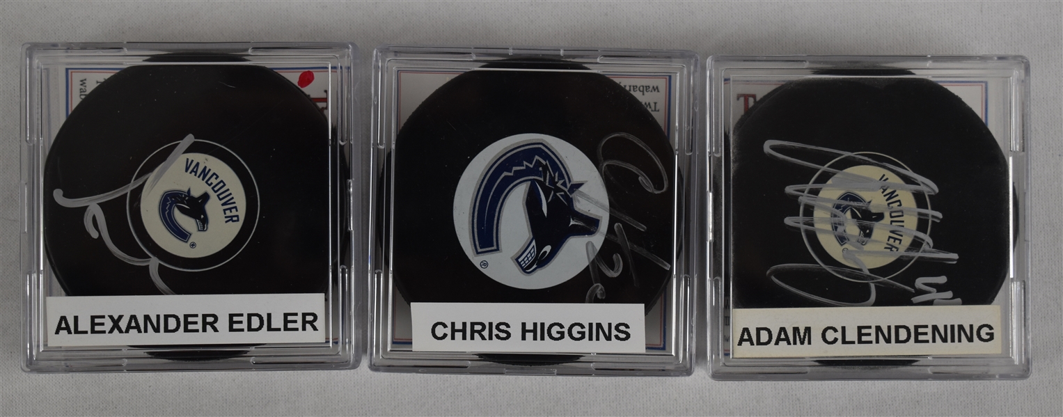 Higgins Clendening & Edler Lot of 3 Autographed Hockey Pucks w/Case