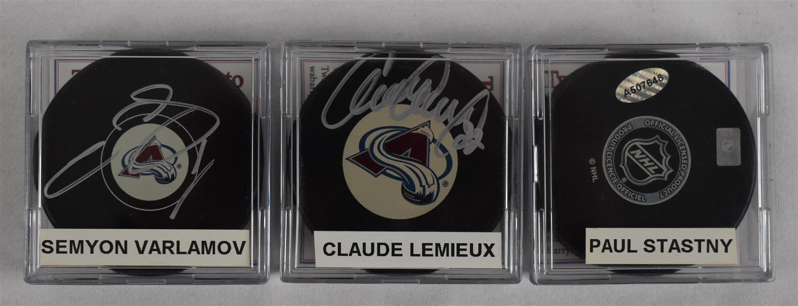 Lemieux Stastny & Varlamov Lot of 3 Autographed Hockey Pucks w/Case