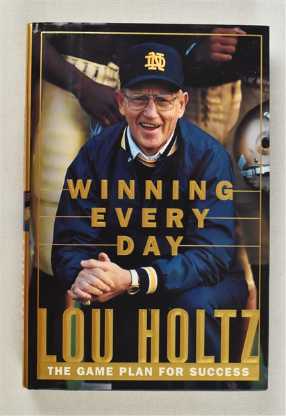 Lou Holtz Signed & Inscribed Book to Sid Hartman