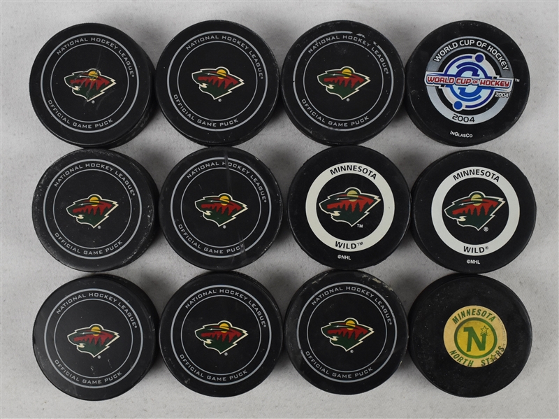 Minnesota Wild & North Stars Lot of 12 Game Used Hockey Pucks