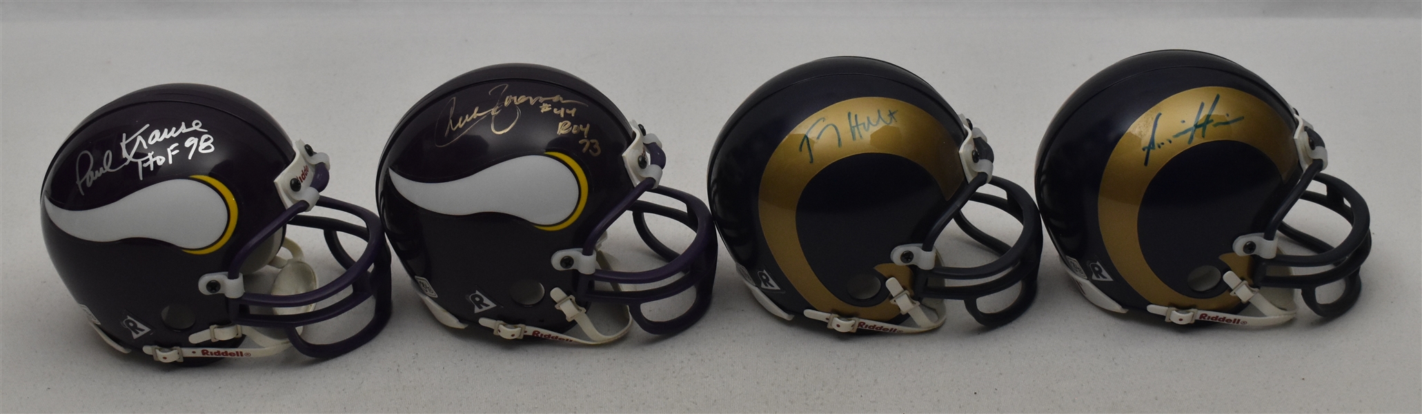 Collection of 4 Autographed Mini Helmets w/Paul Krause Chuck Foreman & Torry Holt