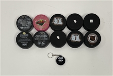 Collection of Minnesota Wild Commemorative Hockey Pucks