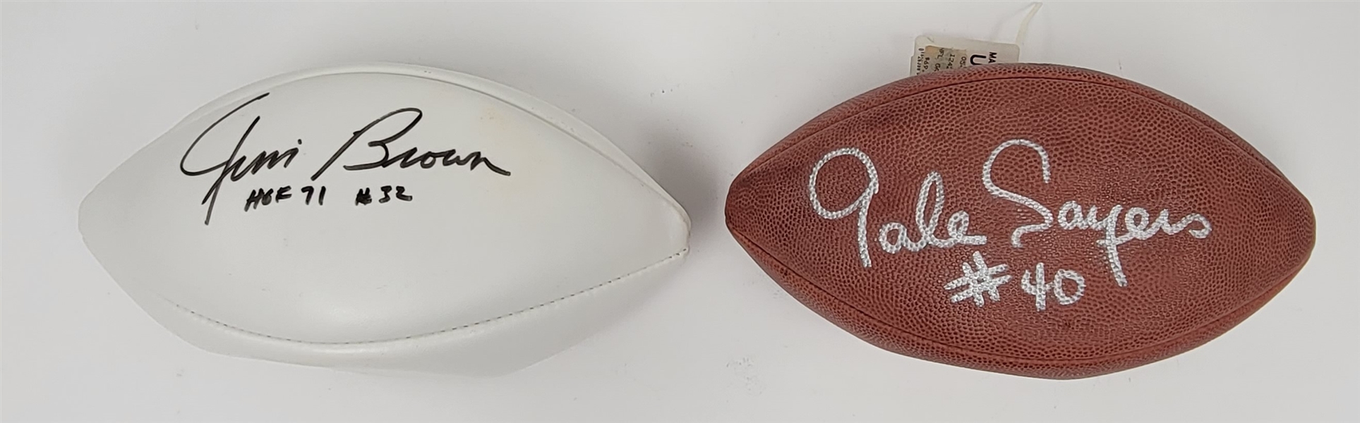 Lot of 2 Gale Sayers & Jim Brown Autographed Footballs Beckett