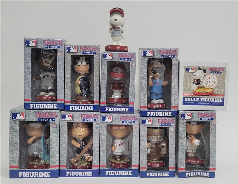 Collection of 11 "Peanuts" Sports Figurines