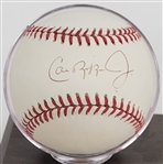 Cal Ripken Jr. Autographed OAL Baseball & Newspaper Cut w/ Display