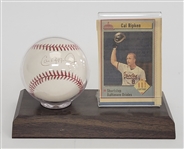 Cal Ripken Jr. Autographed OAL Baseball & Newspaper Cut w/ Display