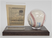 Cal Ripken Jr. Autographed OAL Baseball & Newspaper Cut w/ Display