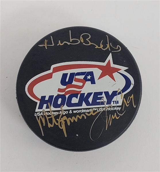 Herb Brooks, Mike Eruzione, & Jim Craig Autographed USA Hockey 1980 Puck w/ Beckett LOA