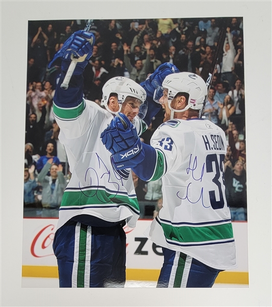 Henrik & Daniel Sedin Dual Autographed 16x20 Photo Beckett