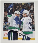 Henrik & Daniel Sedin Dual Autographed 16x20 Photo Beckett