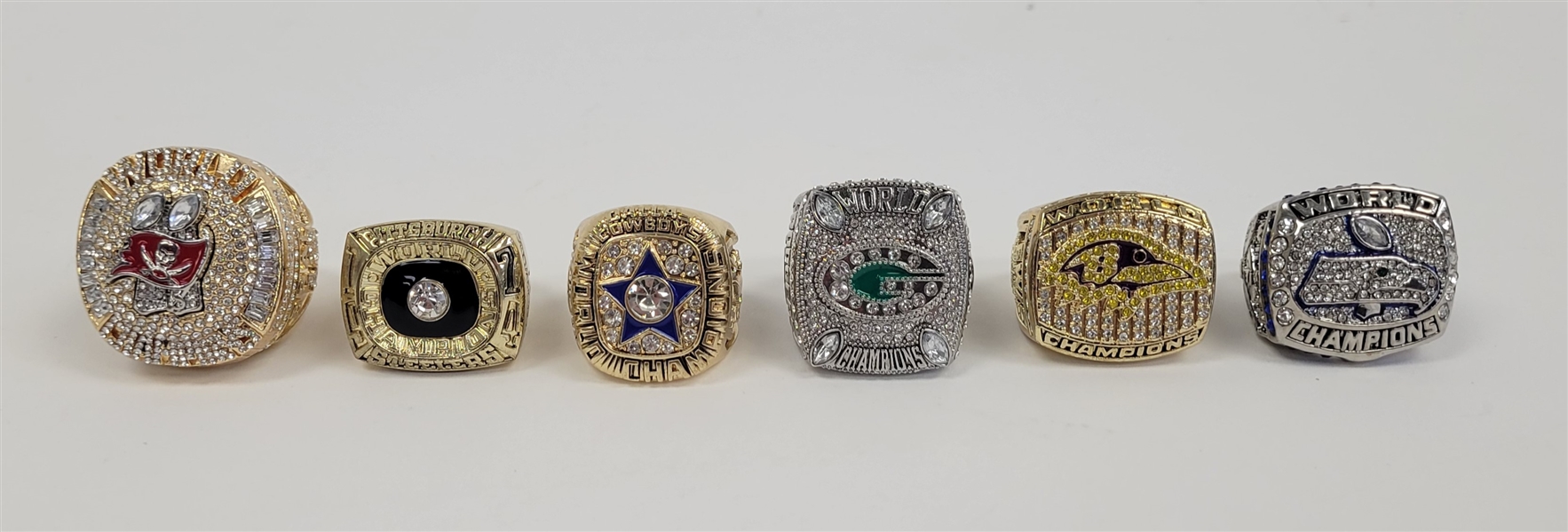 Lot of 6 Football World Champions Replica Rings