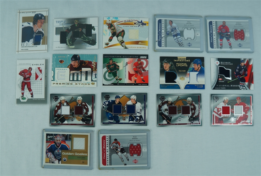 NHL Collection of 16 Game Used Hockey Patch Cards