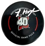 Luke Hughes Autographed New Jersey Devils 40th Anniversary Official Game Puck Fanatics (Stock Photo Used)