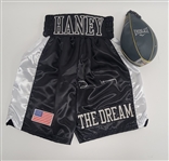 Lot of 2 - Devin Haney Autographed Boxing Shorts & Speed Bag Beckett