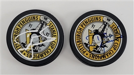 Lot of 2 Tom Barrasso Autographed Pittsburgh Penguins Hockey Pucks JSA