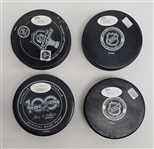 Lot of 4 Matt Murray, Dylan Larkin, Drew Doughty, & Patrik Laine Autographed Hockey Pucks JSA