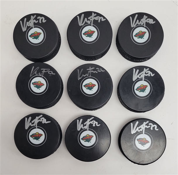 Lot of 9 Kevin Fiala Autographed Minnesota Wild Hockey Pucks Beckett