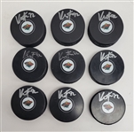 Lot of 9 Kevin Fiala Autographed Minnesota Wild Hockey Pucks Beckett