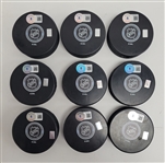 Lot of 9 Kevin Fiala Autographed Minnesota Wild Hockey Pucks Beckett
