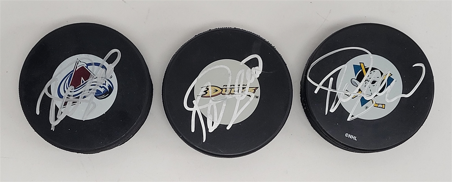 Lot of 3 Teemu Selanne Autographed Hockey Pucks