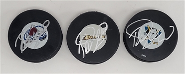 Lot of 3 Teemu Selanne Autographed Hockey Pucks