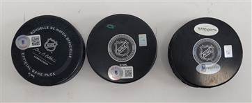 Lot of 4 - Minnesota Wild Autographed Hockey Pucks & Glove Beckett