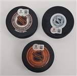 Lot of 3 Bobby Hull, Tony Esposito, & Mike Bossy Autographed Hockey Pucks Beckett