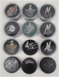 Lot of 12 Minnesota Wild Autographed Hockey Pucks